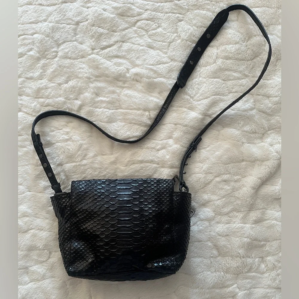 Botkier Leroy Crossbody Bag  with an embossed anaconda or snakeskin texture.